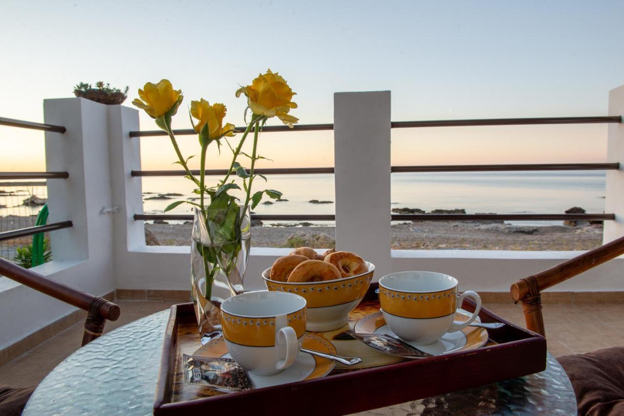 Tsampika'S Beachfront House In Stegna Archangelos  Bagian luar foto